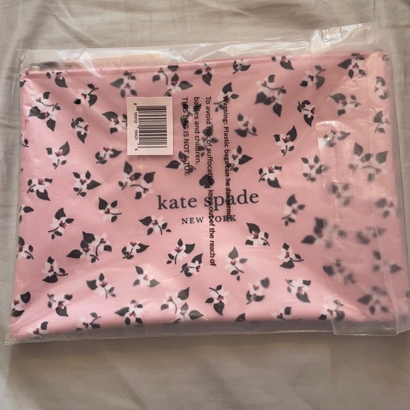 kate spade Handbags - NWT KATE SPADE CANVAS POUCH